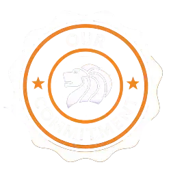 A circular badge with a white scalloped border featuring a lion’s head in the centre. The text reads “OUR COMMITMENT” with stars on either side in orange accents.